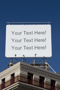 Create KindPics Post or eCards with a Sign On Top of a Building